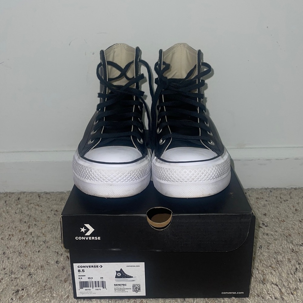 Slightly used platform leather converse.